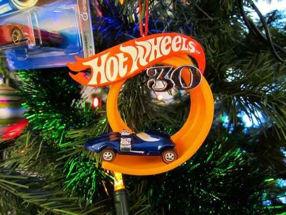 Hallmark's 30th anniversary of Hot Wheels decoration featuring a dare-devil loop and a twin mill car.